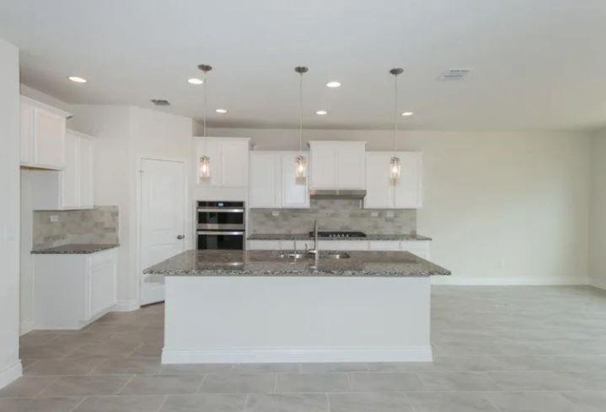 Photo of Pulte home with same floor plan, not of actual home listed.