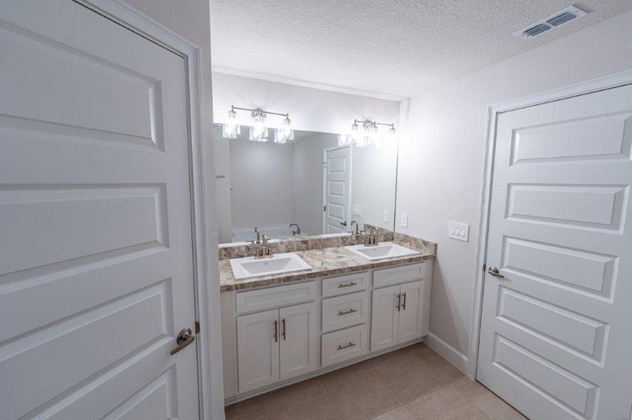 Furnished interior view inside a new home in Bayshore, Port St. Lucie (Image 15). Furnished interior view inside a new home in Bayshore, Port St. Lucie (Image 15).