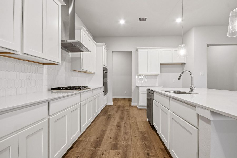 Furnished interior view inside a new home in Sunterra Lakes, Brookshire (Image 6).