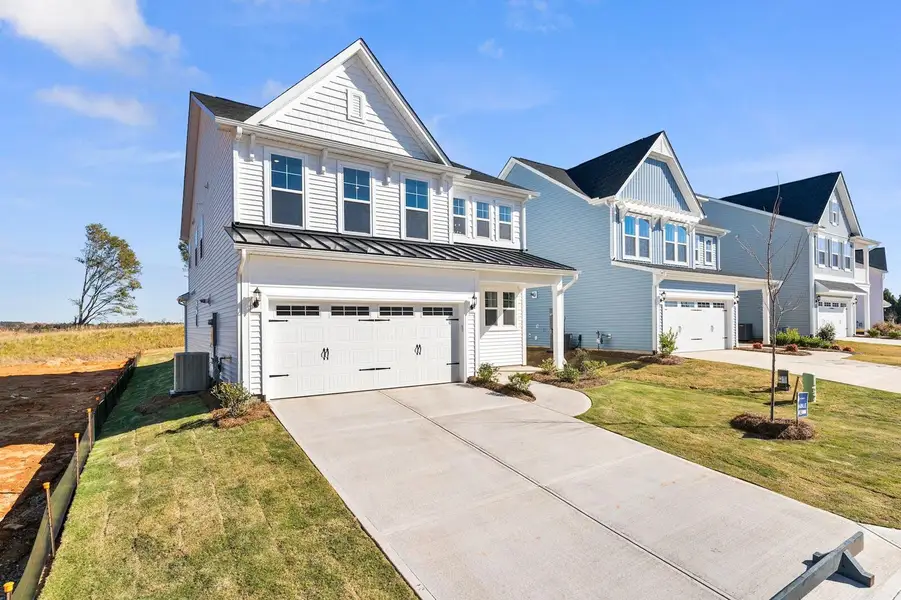Front exterior of a new home in , Summerville, SC, highlighting curb appeal (Image 1). Front exterior of a new home in , Summerville, SC, highlighting curb appeal (Image 1).