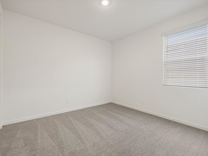 Spacious, unfurnished interior of a new home in Meritage Homes by Teravalis - Reserve Series, Buckeye (Image 11).