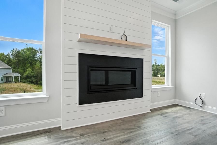 Front exterior of a new home in Hampton Woods, Charlotte, NC, highlighting curb appeal (Image 25). Front exterior of a new home in Hampton Woods, Charlotte, NC, highlighting curb appeal (Image 25).