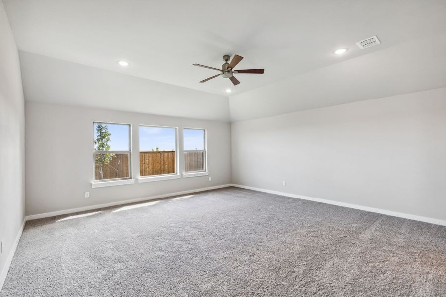 Primary Suite in the Bowie home plan by Trophy Signature Homes – REPRESENTATIVE PHOTO