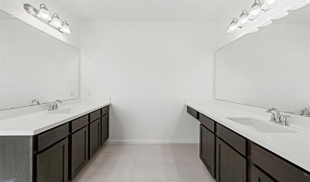 Dual vanity sinks in owner's bath (*Photo not of actual home and used for illustration purposes only.)