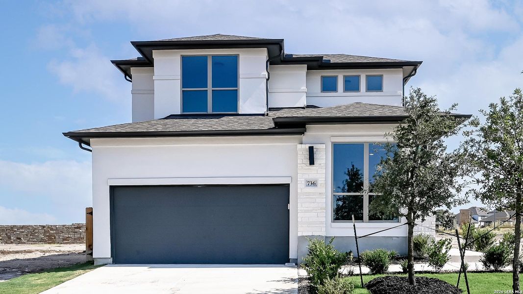 Front exterior of a new home in Legacy at Lake Dunlap, New Braunfels, TX, highlighting curb appeal (Image 21).