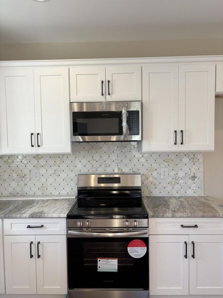 Furnished interior view inside a new home in , Santee (Image 6). Furnished interior view inside a new home in , Santee (Image 6).