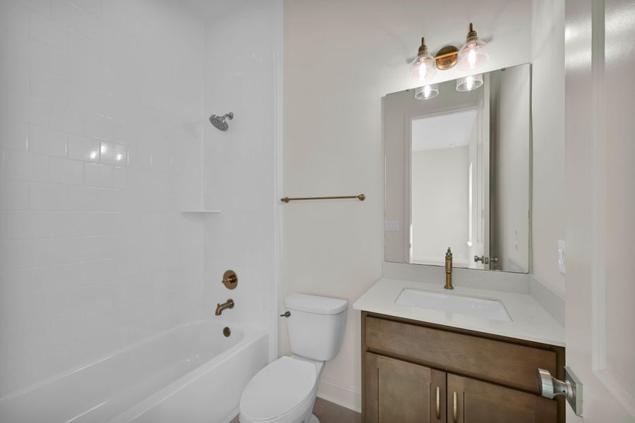Representative furnished interior of a home built from the Hudson II by Riverside Homes in Hidden Creek at SilverLeaf 70' Series, St. Augustine (Image 7).