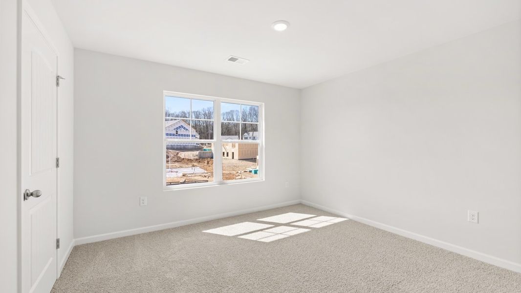 Representative unfurnished interior of a home built from the Hayden by D.R. Horton in Liberty Crossing, Braselton (Image 30).