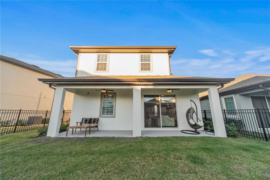 Exterior details and patio area of a home in Reunion Village, Kissimmee (Image 26).