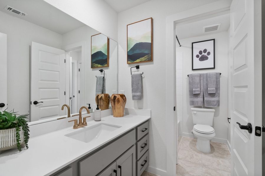 Furnished interior view inside a new home in The Grove at Blackhawk, Pflugerville (Image 17). Furnished interior view inside a new home in The Grove at Blackhawk, Pflugerville (Image 17).