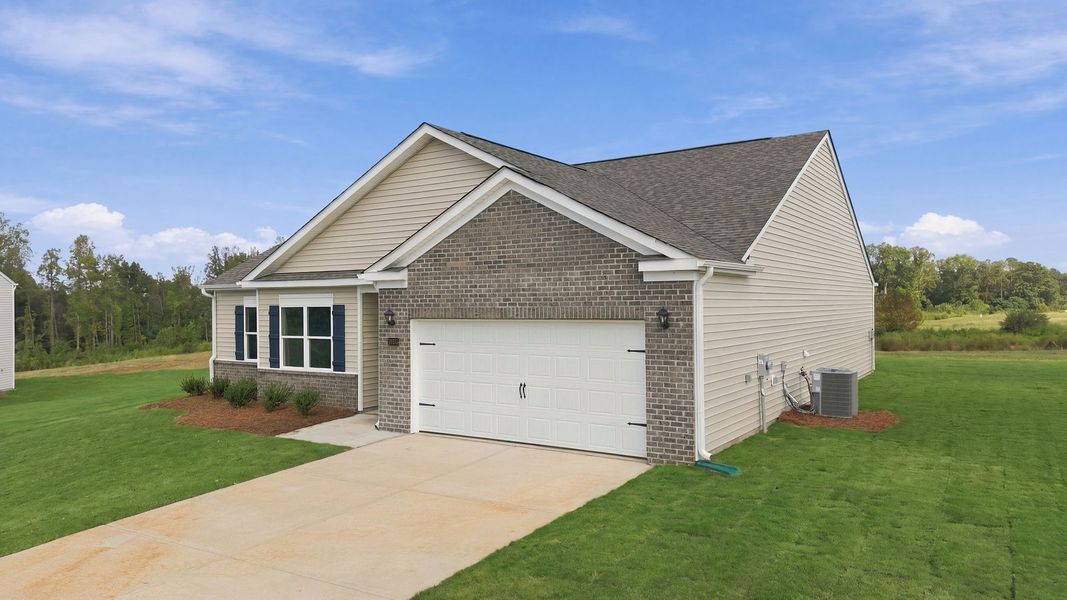 Front exterior of a new home in Beaver Dam Crossing, Bailey, NC, highlighting curb appeal (Image 17).