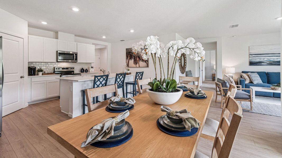 Representative furnished interior of a home built from the Cali by D.R. Horton in Crossroads at Kelly Park, Apopka (Image 9).