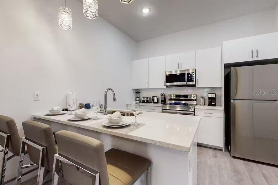 Furnished interior view inside a new home in , Davenport (Image 18).