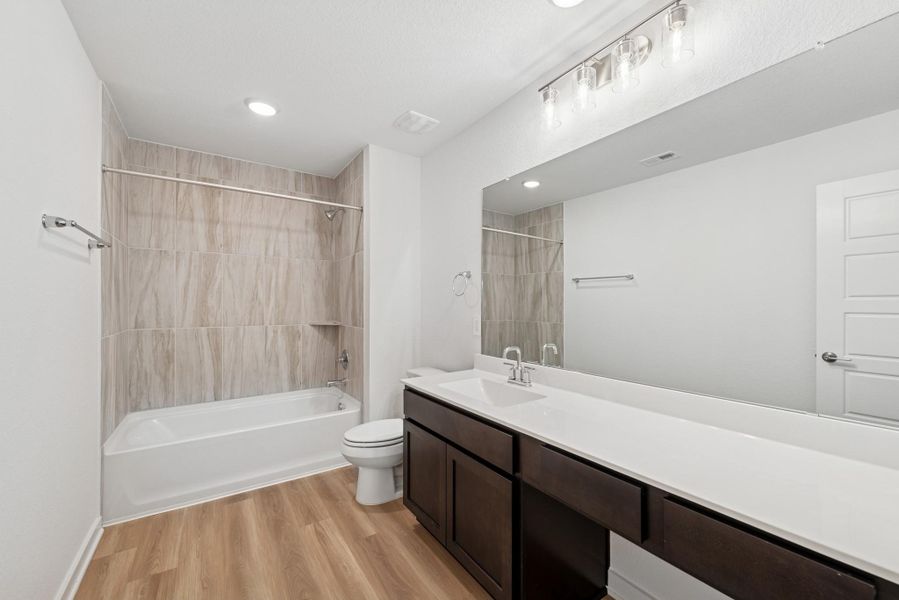 Furnished interior view inside a new home in Lone Star Landing, Montgomery (Image 8). Furnished interior view inside a new home in Lone Star Landing, Montgomery (Image 8).