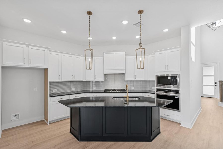 Furnished interior view inside a new home in The Highlands 40', Porter (Image 5).