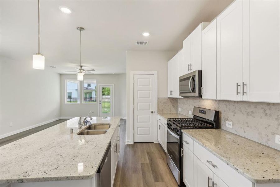 Kitchen includes stainless steel appliances