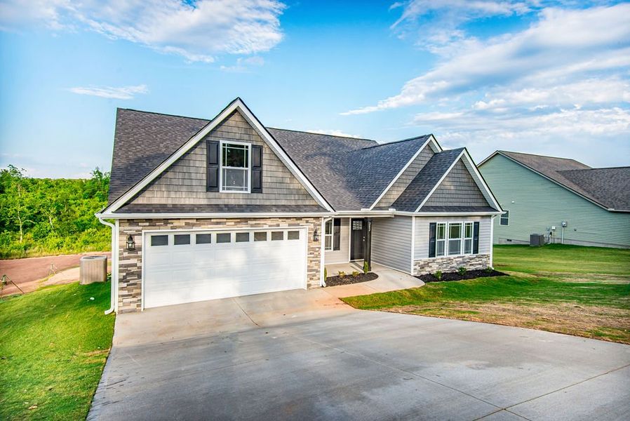 Representative exterior photo of a completed home built from the Arcadimont by Enchanted Homes in Lonesome Dove, San Antonio, TX (Image 17).