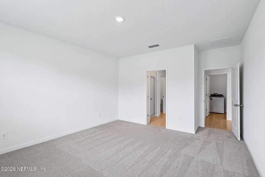 Spacious, unfurnished interior of a new home in Flagler Village - Signature Series, Palm Coast (Image 24).