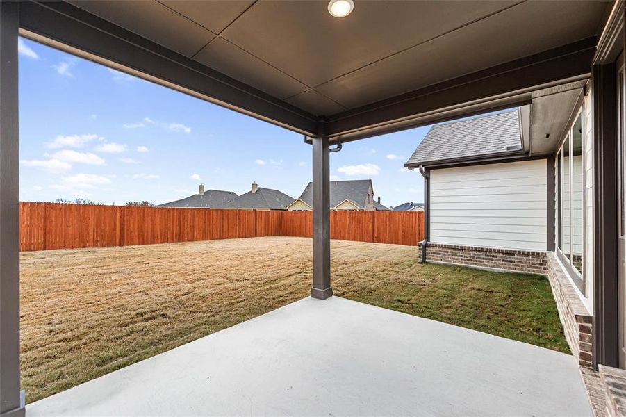 Exterior details and patio area of a home in Northstar, Haslet (Image 24).