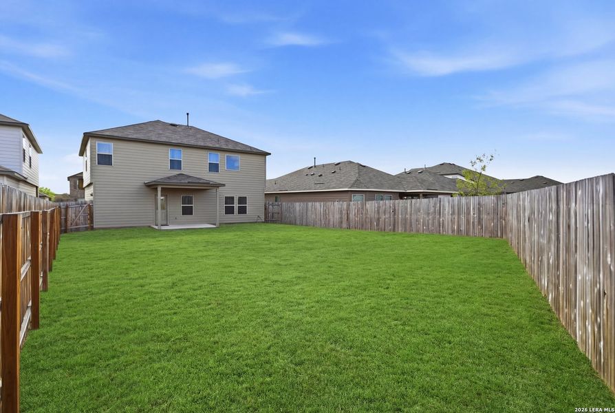 Exterior details and patio area of a home in Winding Brook, San Antonio (Image 3).