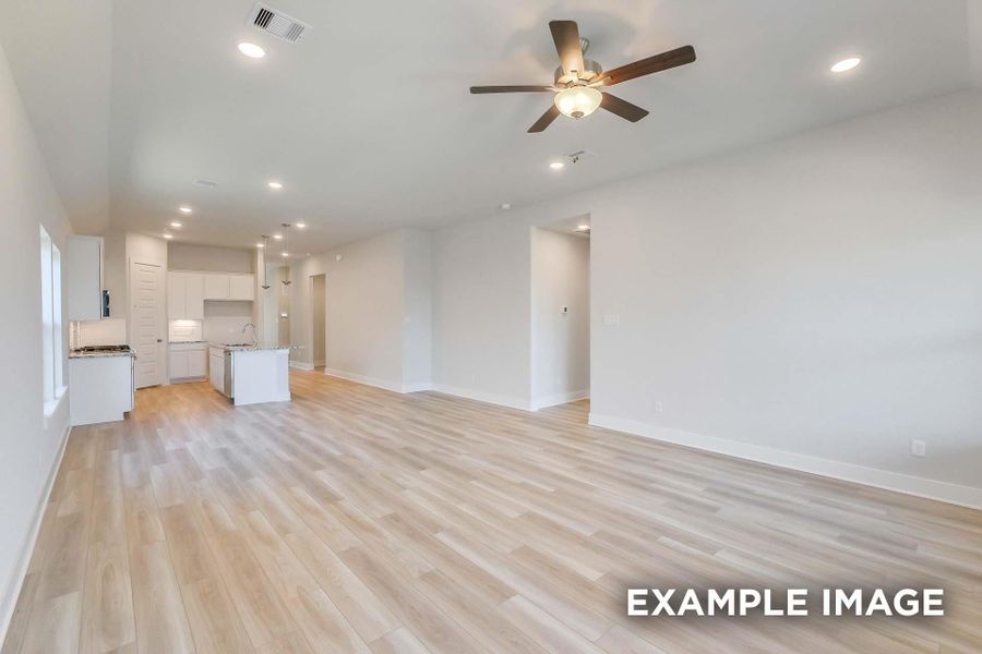 Spacious, unfurnished interior of a new home in Sunterra, Katy (Image 17).