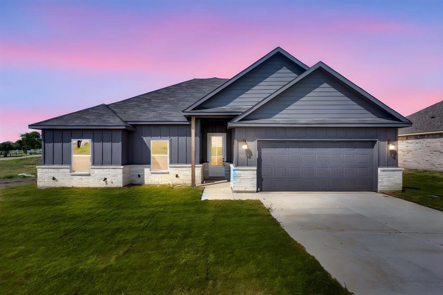 Front exterior of a new home in , Palmer, TX, highlighting curb appeal (Image 23). Front exterior of a new home in , Palmer, TX, highlighting curb appeal (Image 23).
