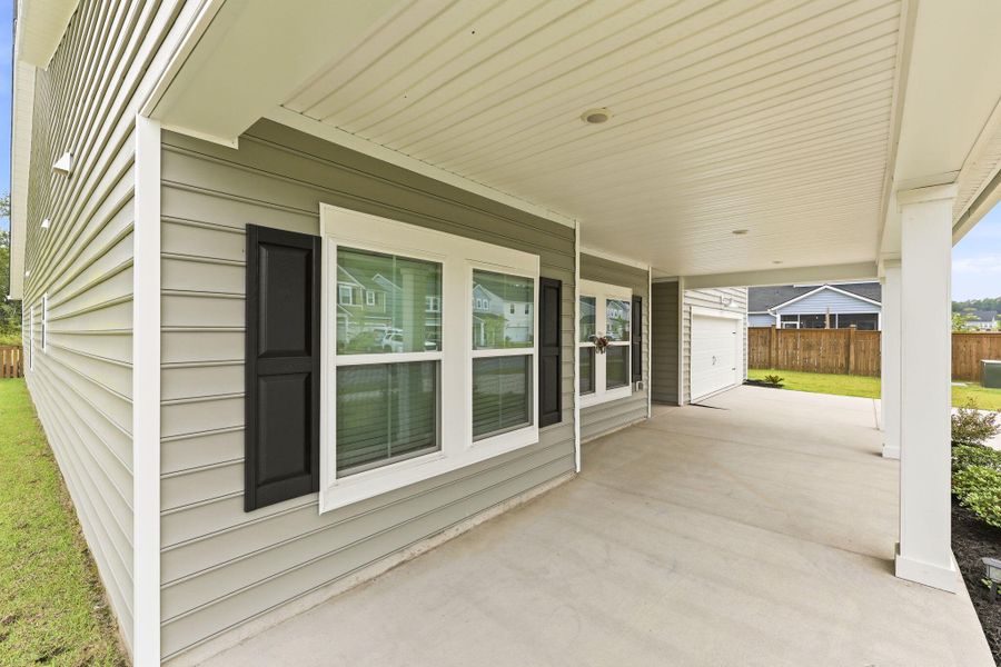 Exterior details and patio area of a home in , Summerville (Image 36).