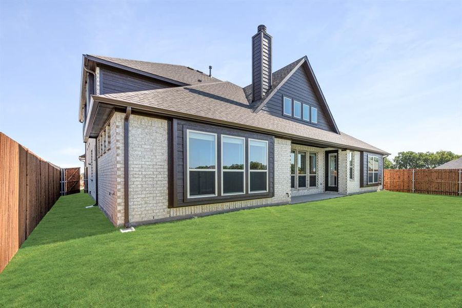 Front exterior of a new home in Timberbrook 3B-4A, Justin, TX, highlighting curb appeal (Image 25). Front exterior of a new home in Timberbrook 3B-4A, Justin, TX, highlighting curb appeal (Image 25).