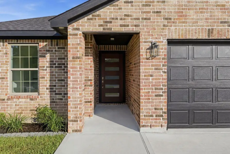 Exterior details and patio area of a home in , Willis (Image 25). Exterior details and patio area of a home in , Willis (Image 25).