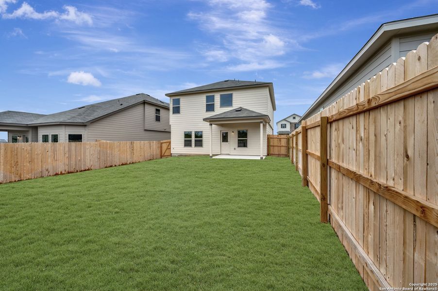Exterior details and patio area of a home in Paloma Park, Converse (Image 25).