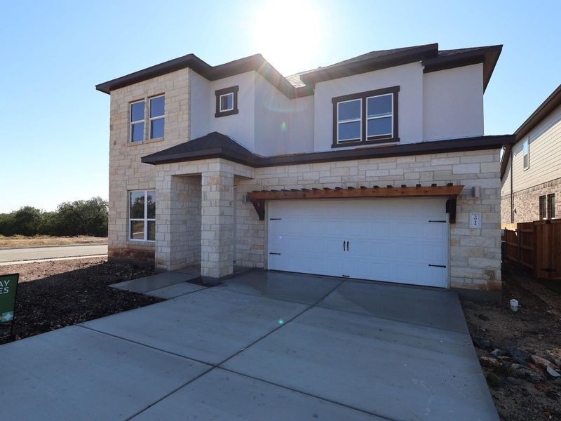 Exterior details and patio area of a home in Edgewood, Leander (Image 13).