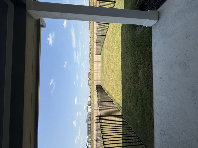 Exterior details and patio area of a home in Avery Centre, Round Rock (Image 3).