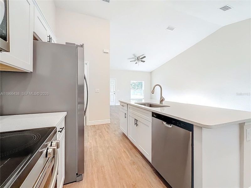 Furnished interior view inside a new home in , Citrus Springs (Image 11).