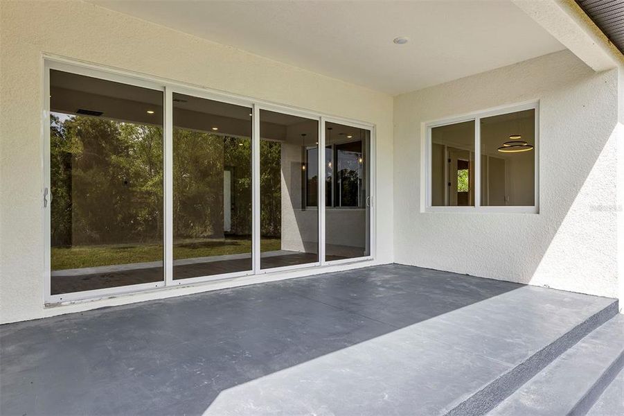 Exterior details and patio area of a home in , Port Charlotte (Image 2).