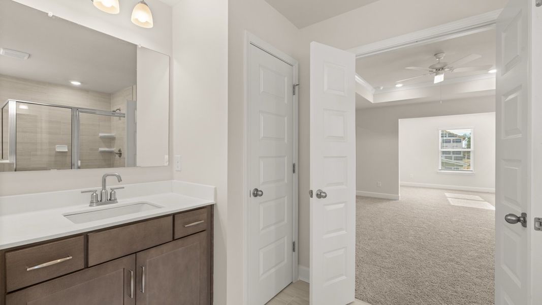 Representative furnished interior of a home built from the Hampshire by D.R. Horton in Heritage Pointe, Senoia (Image 15).