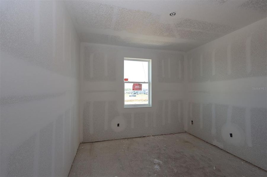 In-progress construction of a new home in Lake Star at Ovation, Winter Garden, FL (Image 15).