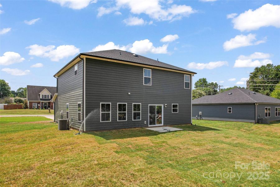 Front exterior of a new home in , Harrisburg, NC, highlighting curb appeal (Image 16).