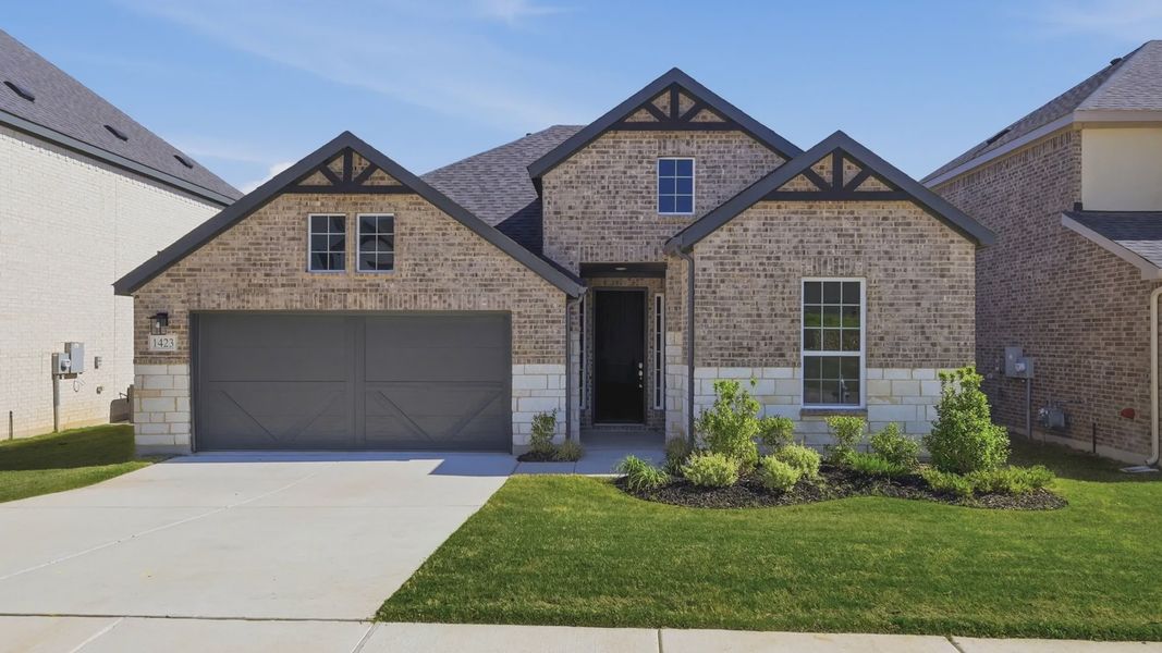 Front exterior of a new home in Green Oaks Preserve, Arlington, TX, highlighting curb appeal (Image 2). Front exterior of a new home in Green Oaks Preserve, Arlington, TX, highlighting curb appeal (Image 2).
