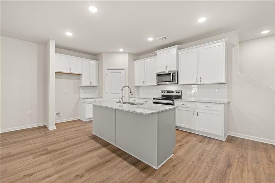Furnished interior view inside a new home in Lake Carlton, Loganville (Image 5).
