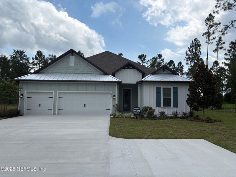 Front exterior of a new home in Stables at Cary Forest, Bryceville, FL, highlighting curb appeal (Image 1).