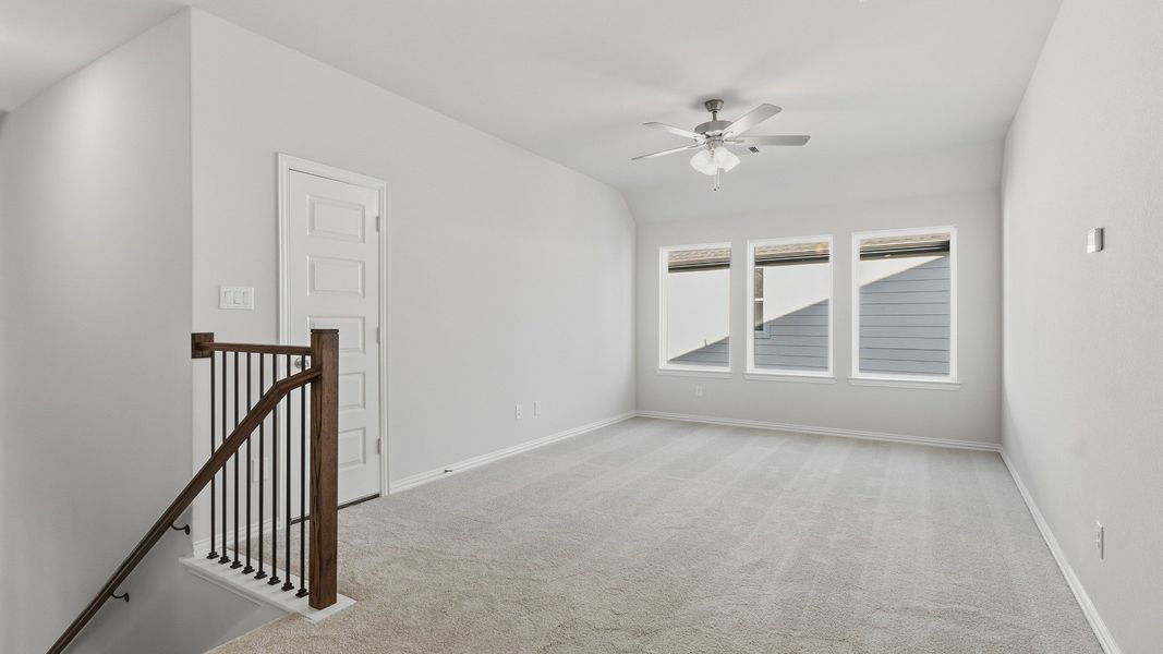 Furnished interior view inside a new home in The Woodlands Hills, Willis (Image 24).