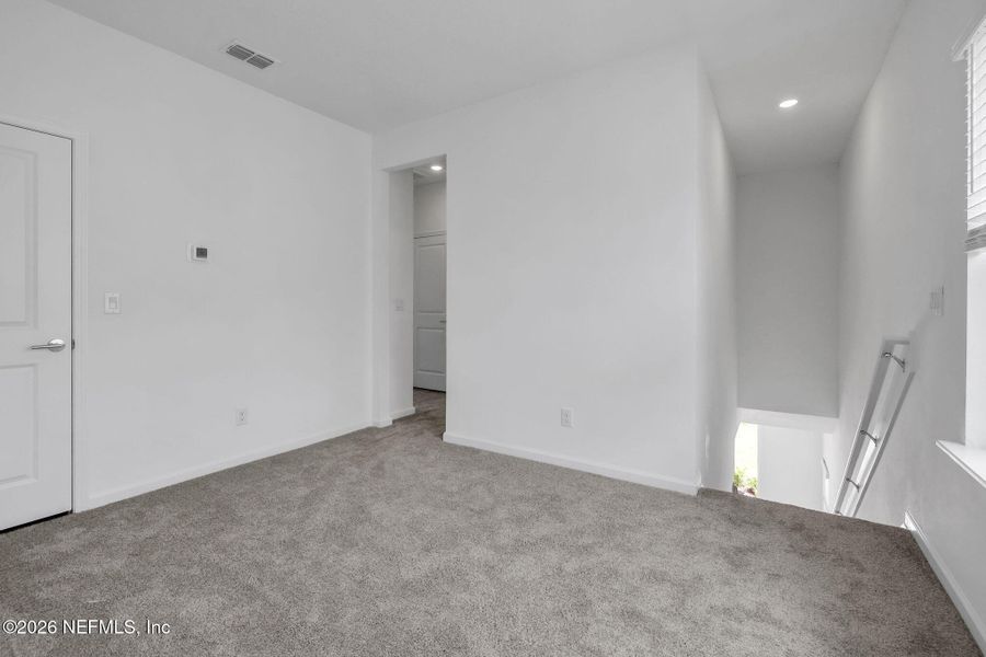 Spacious, unfurnished interior of a new home in TrailMark, St. Augustine (Image 24). Spacious, unfurnished interior of a new home in TrailMark, St. Augustine (Image 24).