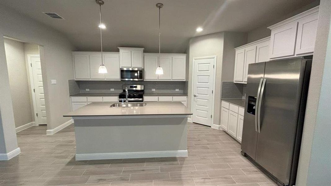 Kitchen - All Home and community information, including pricing, included features, terms, availability and amenities, are subject to change at any time without notice or obligation. All Drawings, pictures, photographs, video, square footages, floor plans, elevations, features, colors and sizes are approximate for illustration purposes only and will vary from the homes as built.