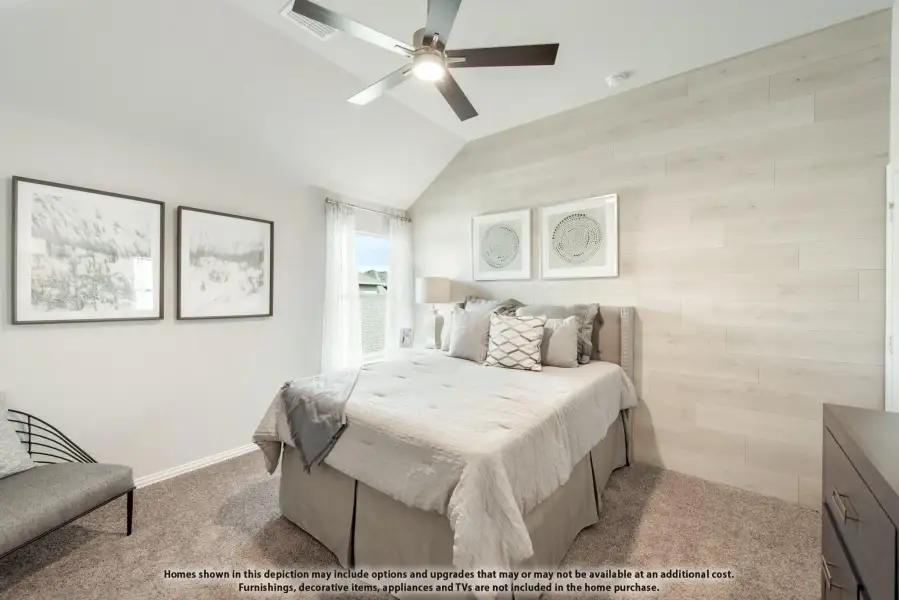 Bedroom with vaulted ceiling, ceiling fan, wood plank accent wall, and carpet flooring
