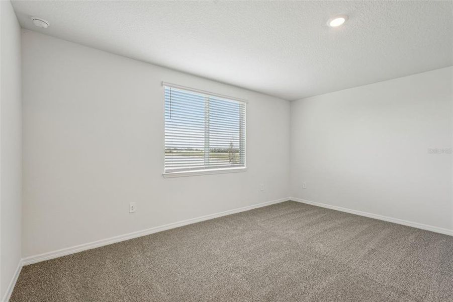 Spacious, unfurnished interior of a new home in Oakfield Trails - Signature Series, Parrish (Image 36).