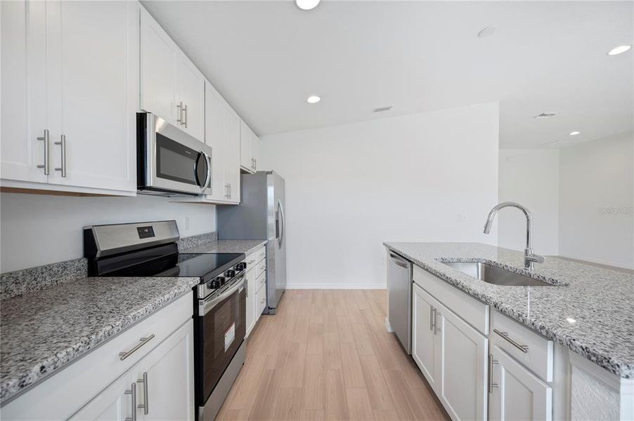 Furnished interior view inside a new home in , Frostproof (Image 6). Furnished interior view inside a new home in , Frostproof (Image 6).