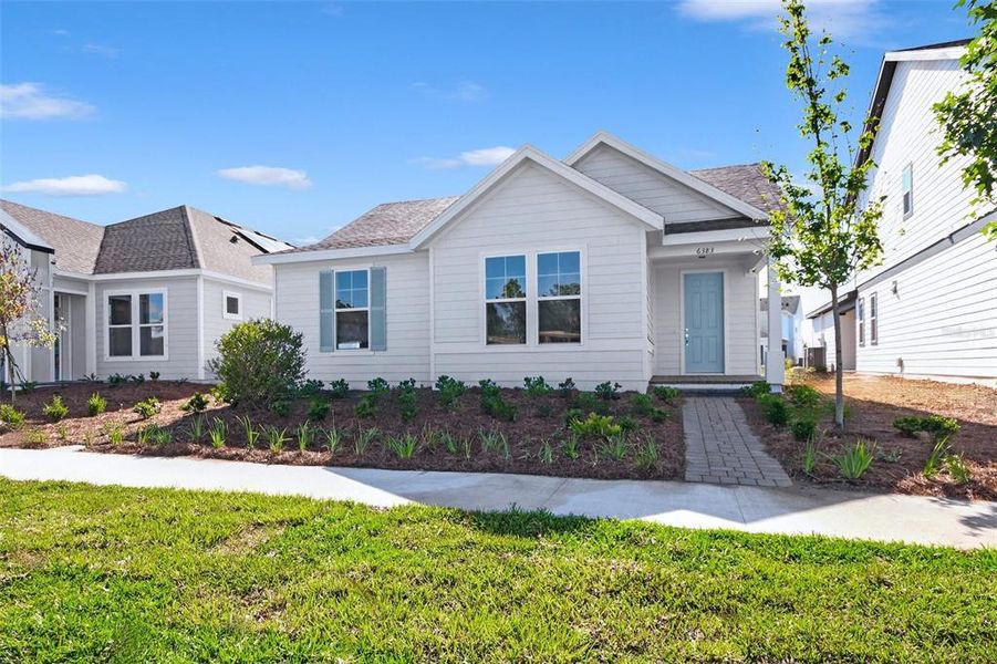 Front exterior of a new home in , St. Cloud, FL, highlighting curb appeal (Image 22).