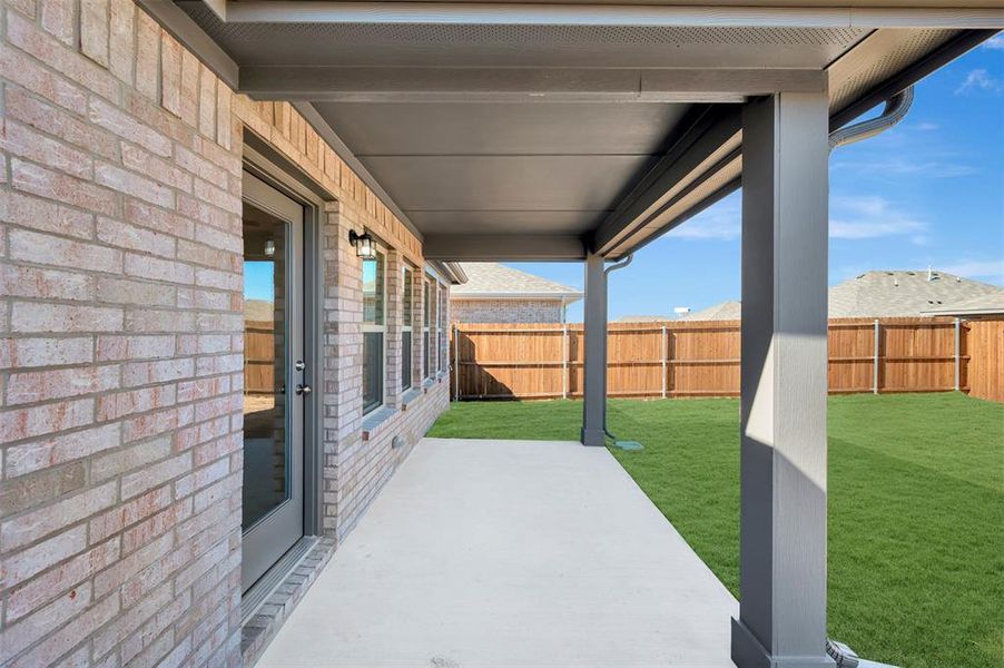 Exterior details and patio area of a home in Verandah, Royse City (Image 23).