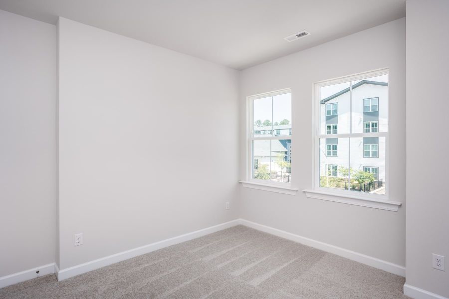 Representative unfurnished interior of a home built from the Kinston by Tri Pointe Homes in Elm Park, Raleigh (Image 17).