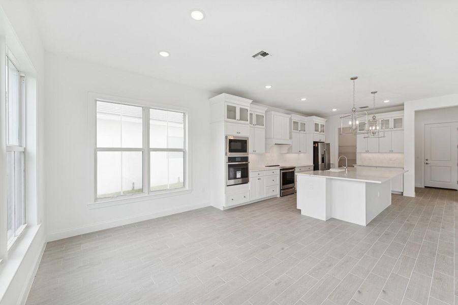Furnished interior view inside a new home in Salerno Reserve - Single Family, Stuart (Image 13). Furnished interior view inside a new home in Salerno Reserve - Single Family, Stuart (Image 13).